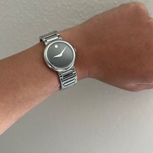 Women’s Movado silver and black watch. Battery not included.
